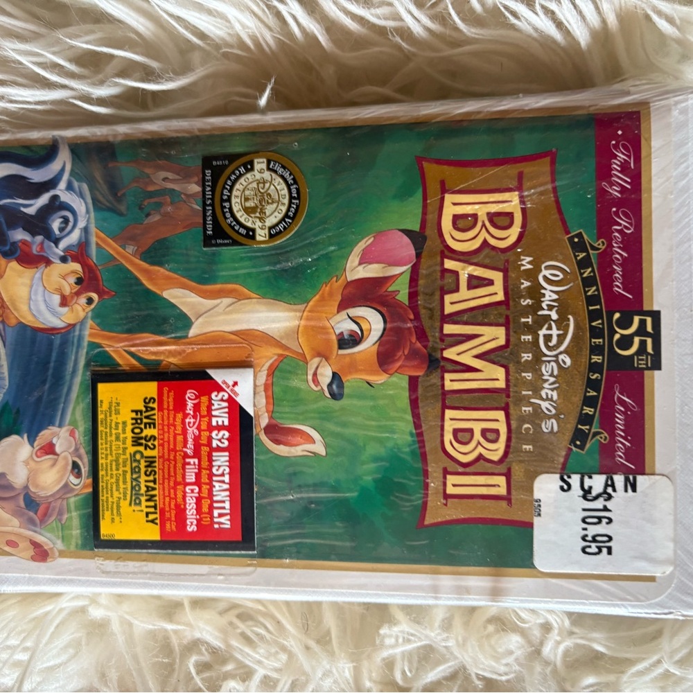Disney Bambi DVD in bright green cover with pink accents